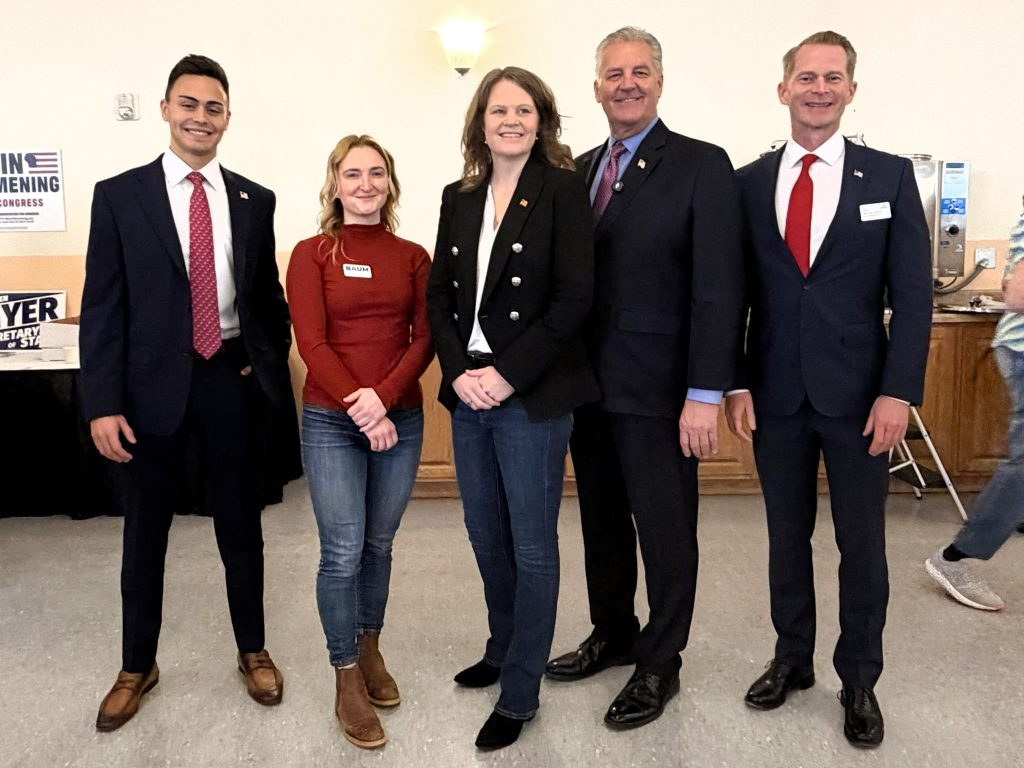 7th congressional district candidates lined up for a group photo at the 2026 7th CD Caucus